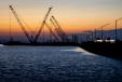Cranes at sunset on FDOT’s new southbound/westbound interstate bridge over Old Tampa Bay project.
(Florida Department of Transportation photo)