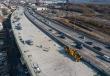 Crews work on the slipform barrier on I-95 in Philadelphia. 