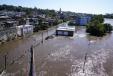 The Schuylkill River exceeds its bank in the Manayunk section of Philadelphia, Thursday, Sept. 2, 2021, in the aftermath of downpours and high winds from the remnants of Hurricane Ida that hit the area. (AP Photo/Matt Rourke photo)
