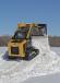 Loaders with a low ground pressure can sometimes have the ability to drive up snow piles, giving operators the ability to stack snow higher before needing to start a new pile.