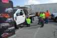 Attendees check out the Monroe Truck Equipment display. 