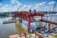 The project includes the removal and replacement of the three river-span trusses; seismically retrofitting the existing river piers; and improving the east approach.
(Walsh Construction and Trey Cambern Photography photo) 