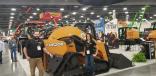 Nathaniel Waldschmidt (L), product manager of Case, and Jessica Klein, marketing manager, show off the new Case TV620B, the largest compact track loader ever built. Features include a rated operating capacity of 6,200 lbs.; breakout force of 12,907 lbs.; and bucket capacity of 12,084 lbs.
 