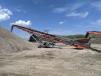Cross-Tech 80 by 36-ft. radial conveyor stockpiles crushed recycled concrete. 