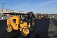 A Caterpillar CB 2.7 double drum 47-in. 3-ton asphalt roller is on the job site.
(CEG photo)