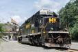 SD40-2 #3549 leads the aggregate train with a 773 dumping into the hopper above the train. (Photo courtesy of H&K.) 