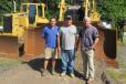 Glenn McAllister (C) of McAllister Construction Co., is flanked by Tim Dewey (L), site manager, and Mike Hunyady, president, both of Hunyady Auction Company.
(CEG photo)