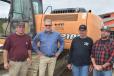 (L-R) are Eric Hewins; Chris Reseska, of Monroe Tractor; Walter Hewins Sr.; and Walter Hewins Jr.
(CEG photo) 