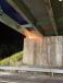 A street view of diaphragms being cut from the top of the bridge.(Photo courtesy of Maine DOT) 