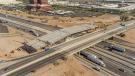 In summer 2021, crews removed the rubberized asphalt from the surfaces of I-10 and U.S. 60 in the project area. That work created 1.3 million sq. yds. of millings, which are being used as the base layer for temporary haul roads in the project area. (Photo courtesy of ADOT.) 