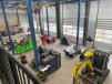 Through the design and construction process, overhead cranes were incorporated in the shop to assist in the work on larger pieces of equipment; larger doors were incorporated to make access easier; a mezzanine was incorporated for parts storage.
