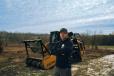 Jon Butcher, CEO of third generation, family-owned Madison Tree and Landscape, with a Fecon 125VRT mulching tractor compact track loader. 