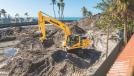An operator removes material along a Florida beachfront property with a Komatsu PC210LC-11 excavator. “We prefer Komatsu equipment because it’s sturdy, safe and reliable,” said President Mark Austin.
(Linder Link Magazine photo) 