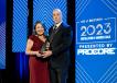 Nataline Lomedico (L) accepts the Specialty Contractor Achievement Award from presenter Greg Timmerman of ISEC Inc.
(Photo courtesy of Jayrol San Jose/AGC of California.) 