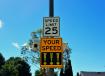 Dynamic electronic signs show the work zone speed limit above a vehicle’s speed, flashing when motorists are driving above the limit. 