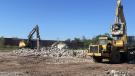 Crews at the former Avondale Mills site are sifting through piles of rubble, preparing the site for construction of the East Alabama Rural Innovation and Training Hub (EARTH).(Difference Architecture LLC photo)
