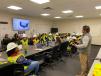Skanska Vice President Todd Reeves discusses careers in construction and prepares students for a jobsite visit.
(Skanska photo) 