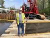 Teddy Webb, project superintendent of Clearwater Construction, stands with the column form to make the next 3-ft. by 3-ft. square.
(CEG photo) 