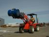 The AI barrel handler is designed to handle 35-, 55- and 85-gal. drums. This attachment is available for use with the optional hydraulic rotating mount. 