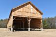 A just completed tobacco barn. Open ventilation at the bottom and ends of the barn provides proper ventilation for the curing tobacco.
(CEG photo) 