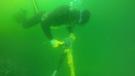 PDIST using an Atlas Copco LH 390 hydraulic breaker underwater for drilling rocks. 