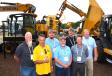 Hydrema brought out a nice array of its lineup of trucks and excavators, featuring a Hydrema with a mounted tinbin vacuum excavation attachment and representatives including (L-R) John Millsaps, Stefan Mattes (tinbin), Matt Sfeir, Allen Patterson, Barry Ferrell, Kris Binder and Don Dubey (tinbin).
(CEG photo) 