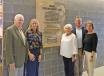 (L-R): Ray Roland, Rachel Pennell, Mary Beth Roland, Matt Roland and Julie Roland, with the plaque honoring the Roland family’s support of the Diesel Technologies Lab at Lincoln Land Community College.
(Roland Machinery Co. photo) 