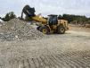 The Cat 950 wheel loader picks up another full load with ease.(CEG photo)