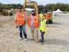 (L-R): Jeff Raper and Daniel Church, both of Bottom Land Site Solutions in Statesville, N.C., are learning about the Cat 308 excavator from Natasha Demaio of Carolina Cat.(CEG photo)