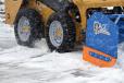 Skid steer snow tires, such as KAGE Klawz are often larger in diameter than skid steer tires designed for dirt.
(KAGE photo) 