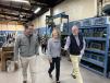 AEM Senior Vice President Kip Eideberg (L) and Conn-Weld Industries President Marvin Woodie (R) lead U.S. Sen. Shelley Moore Capito on a tour of Conn-Weld’s facility on Nov. 17, 2023. (Association of Equipment Manufacturers photo)