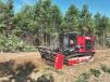 At a North Carolina property, Chase Allen mulches a pine tree with a Fecon FTX150-2 mulching tractor. 
(Linder Industrial Machinery Company photo) 