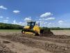 An operator uses DeCook Excavating’s Komatsu D71PXi-24 dozer with intelligent Machine Control to grade for a road at Moon Valley, a residential development in Genoa, Minn. “The iMC has surpassed my expectations on what it can do,” said Jody Beck, project manager. 
   (Photo courtesy of RMS)