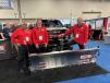 (L-R): Western Plows of Milwaukee, Wis., had its sales team featuring Ray Nunez, Kevin Dyer and Dave Forsmark show attendees the extensive Western snow and ice product lines.   (CEG photo)