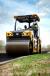 Making tight turns on hot asphalt can result in mat tearing that can lead to quality issues. The dual split-drum option on the front drum can help eliminate tears when maneuvering around obstacles or when compacting tight turns by reducing the speed of the inner drum half.    (Photo courtesy of Caterpillar)