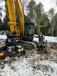 Adam Longto, president and founder of Longto Tree service, has been impressed with his Kobelco and attachments purchased from Robert H. Finke & Sons.   (Longto Tree Service photo)