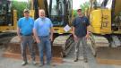 (L-R): Dave Lepor, owner of Center Line Services of Cape May, N.J.; Dan Taylor, territory manager of Bucks County of Foley CAT; and Curtis Warburton of Center Line Services, make a deal on this 2019 Cat 315F excavator.   (CEG photo)