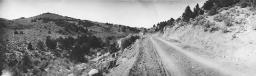 A view of the new Federal road in Austin, NV, through the Toiyabe National Forest. Note old trail down in wash; old trail grades 10 to 12 percent, maximum on new road 6 percent (Oct. 1, 1920). (Photo courtesy Lincoln Highway Collection, Special Collections Library, U. of Michigan)
