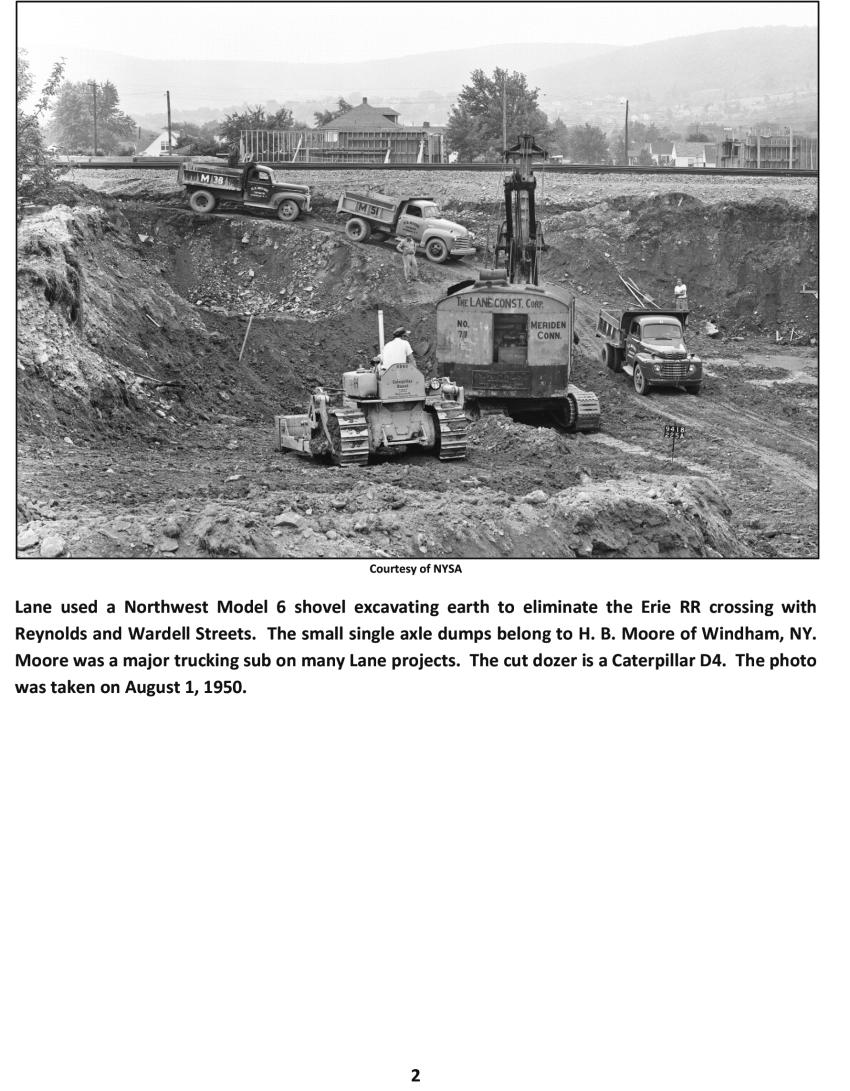 NYSA photo
Lane used a Northwest Model 6 shovel excavating earth to eliminate the Erie RR crossing with Reynolds and Wardell Streets. The small single axle dumps belong to H. B. Moore of Windham, N.Y. Moore was a major trucking sub on many Lane projects. The cut dozer is a Caterpillar D4. The photo was taken on Aug. 1, 1950