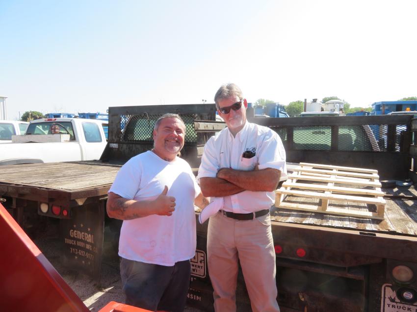 Alex Lyon & Son’s Anthony James Mossow (L) and Scott Moyer are ready to help customers at this auction. 
