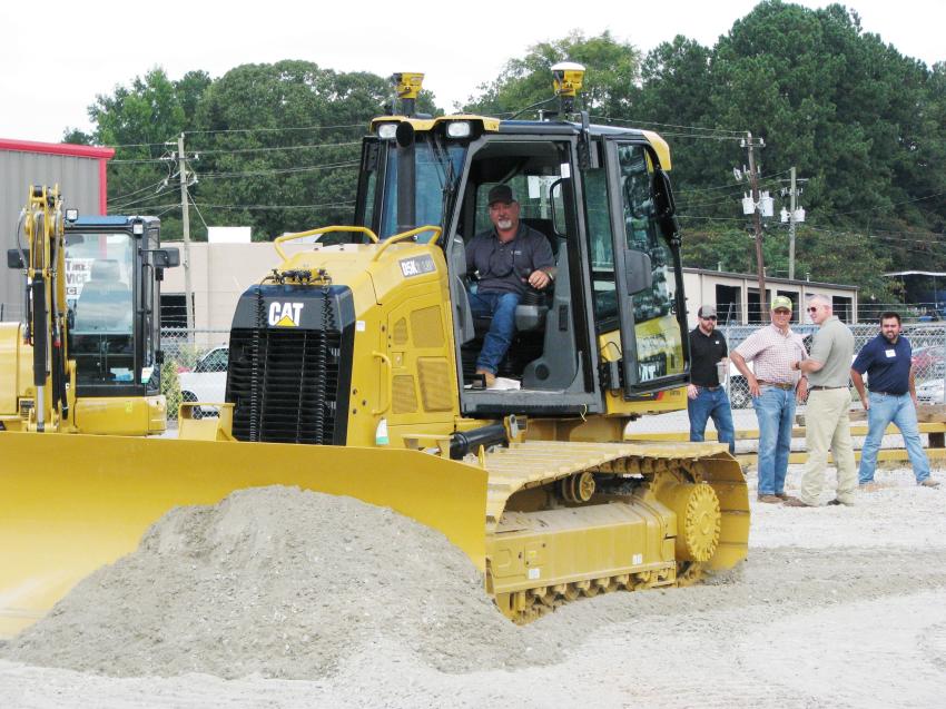 Operating the new Cat D5K2 LGP dozer for the first time, Chad Lanier of Summit Grading Services, Cartersville, Ga., was impressed with the simplicity of the Grade Control system on the machine, which virtually did the work for him. 
