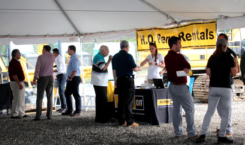 The H.O. Penn rental booth inside the product support tent was kept busy throughout the event.