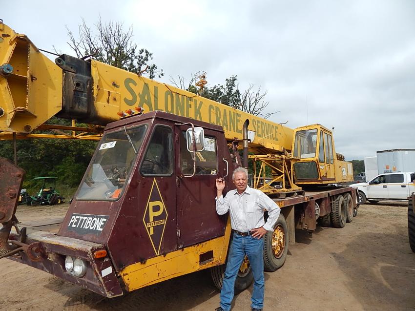 Part-time equipment broker Jim Fuhol considers bidding on a 50-ton Pettibone carrier crane.  Fuhol retired from EJM Crane Service in Lino Lakes, Minn., after 40 years as a crane operator.
