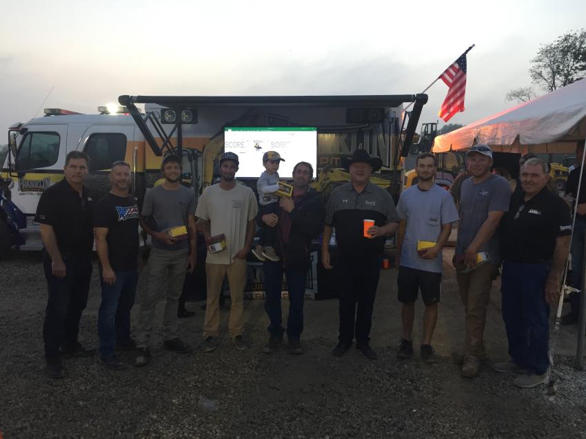 (L-R): Tom Richardson and Tony Repeta, Franklin Equipment owners; Joe Weber, first place Skid Steer Rodeo winner; William Pieper, fourth place winner; Tom Friberg, second place winner; Troy Gabriel, Franklin owner; Alex Cannistra, fifth place winner; Tyler Weber, third place winner; and Gary Gabriel, Franklin owner, pose for a celebratory photo after the final round. 
