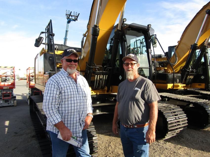 Kevin Woods (L) and Bret Hafen of Woods Trucking, Salt Lake City, Utah, drove a good distance to acquire some used equipment for their company. This Cat 320E excavator was one of the several pieces they considered.
