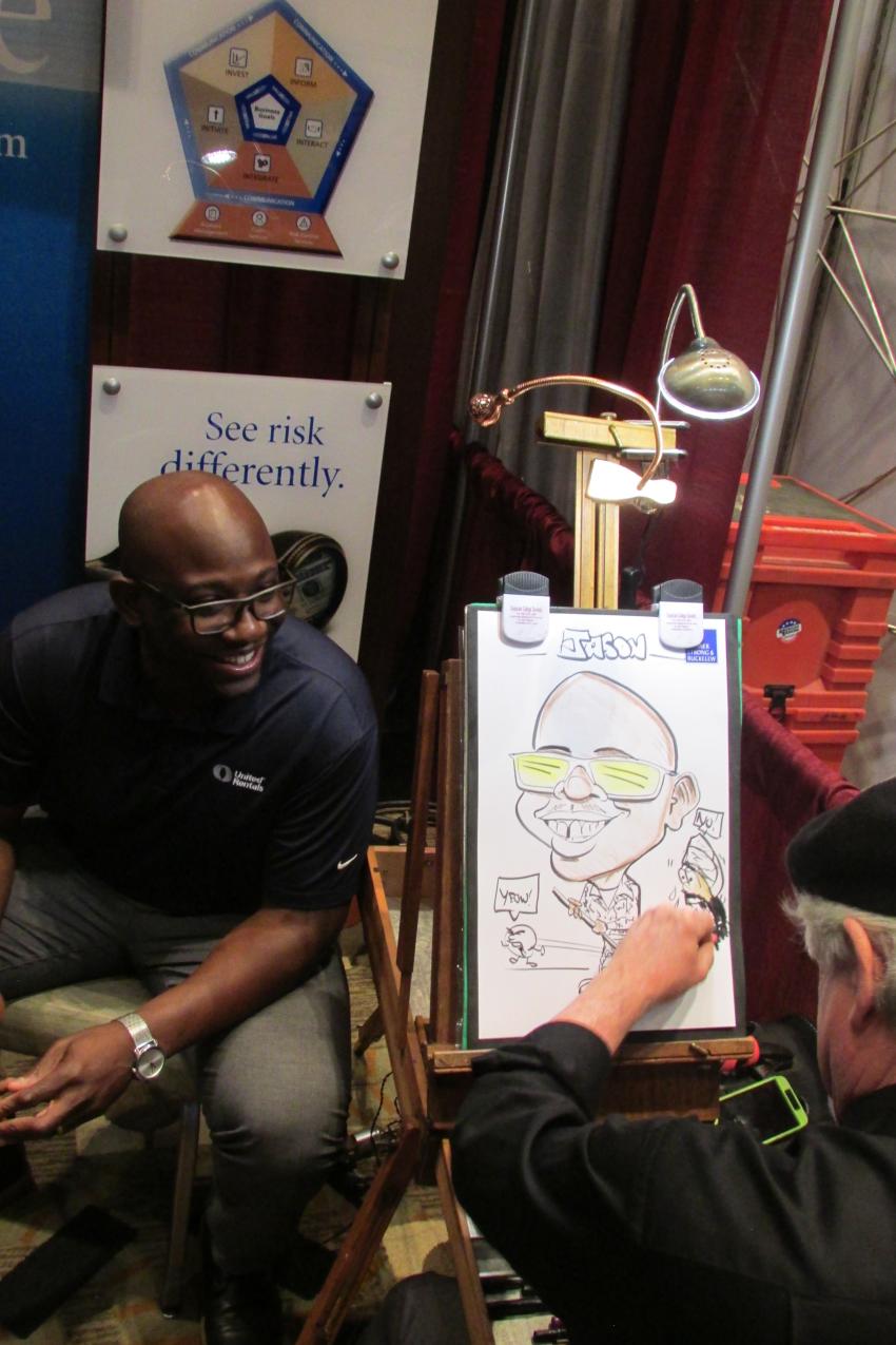 A caricature artist adds to the fun at the UTCA convention.
