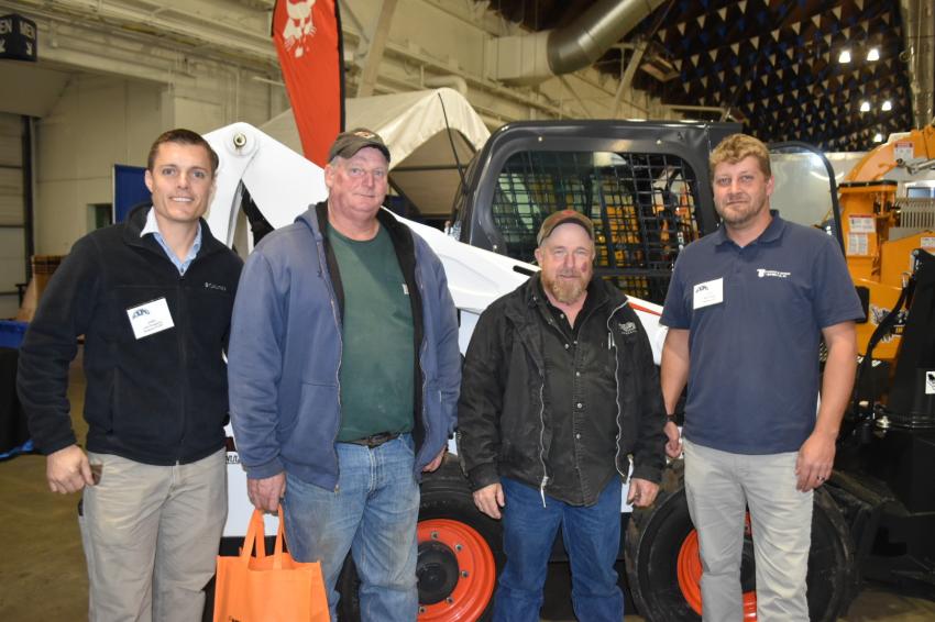 In the Bobcat exhibit (L-R) are Shawn Dougherty of Bobcat of CNY; Sam Aherin and Doug Fellows, both of the town of Marcellus Highway Dept.; and Steve Smith of Bobcat of CNY.