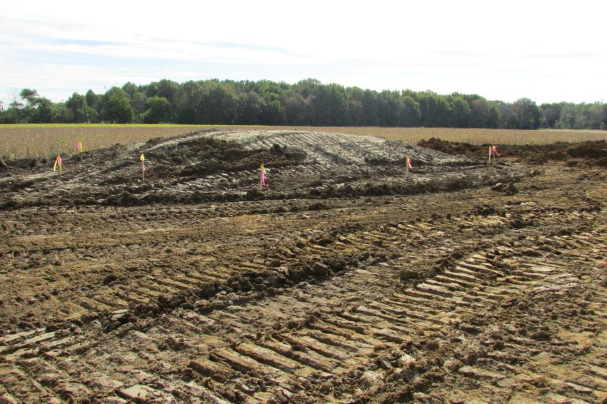 Each day, attendees could win a JESCO branded jacket by estimating the volume of dirt in this pile on the demo field the company created prior to the roadshow.