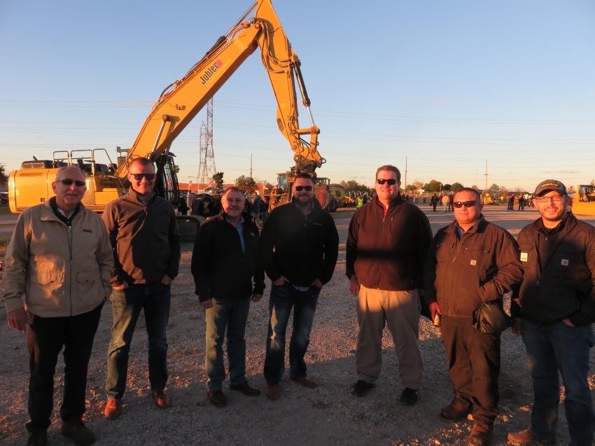 Larry O’Neill (L), Altorfer CAT, welcomes everyone to Iron Night. (L-R): Jacob Mrugacz, Bluff City Materials; Daryl Seymour and Chad Seymour of William Charles Construction; Chris Rooney and Oscar Carranza of Advanced Disposal; and Jared Bontz, Altorfer CAT. 
