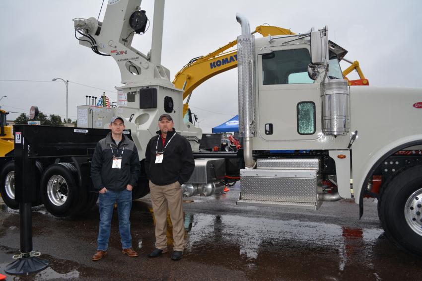 National Crane’s new tractor-mount crane, the NBT30H-2, was introduced to the oil industry by Kirby-Smith Machinery, National’s dealer in the Permian Basin. The crane offers full 360-degree stability with or without a trailer attached. JC Hoffman (L), senior engineer of Manitowoc, and John Arterberry, Kirby-Smith’s National Crane manager, were available to answer potential buyers’ questions.

